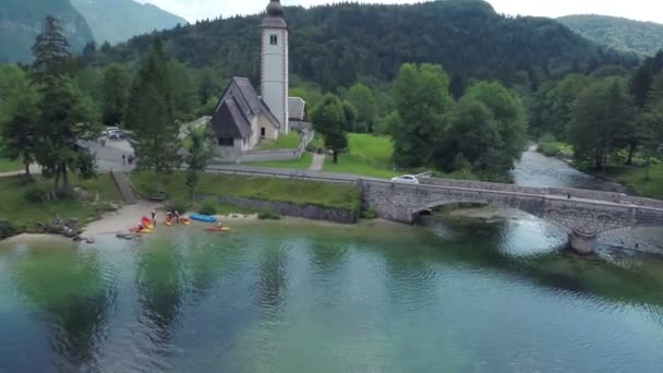 Church on the beach of the lake — Stock Video