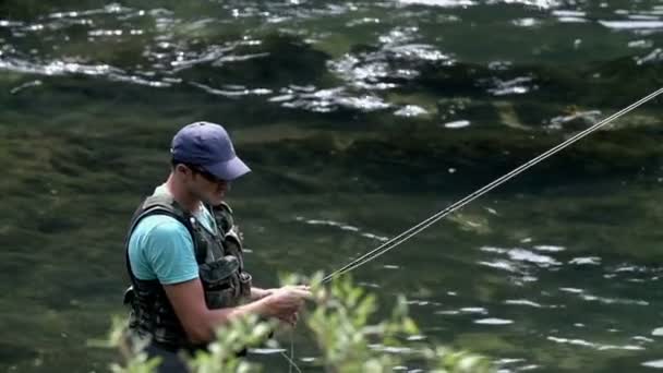 Fisherman in his full equipment uniform — Stock Video