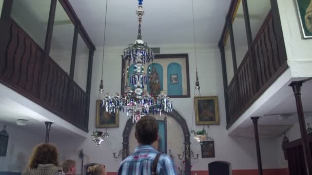 Vintage chandelier hanging in the small church — Stock Video