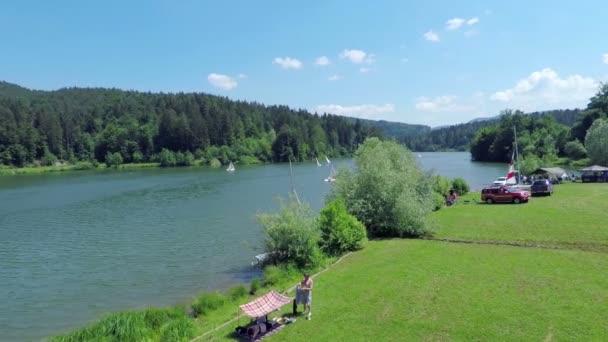 View of the lake with its surrounding banks — Stock Video