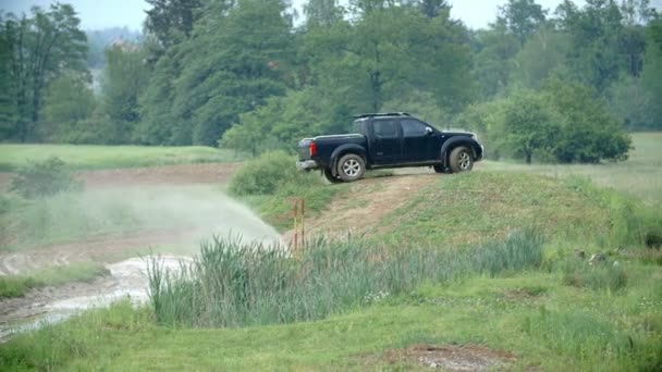 Car rides on dirty road — Stock Video