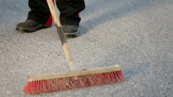 Man sweeps the floor — Stock Video