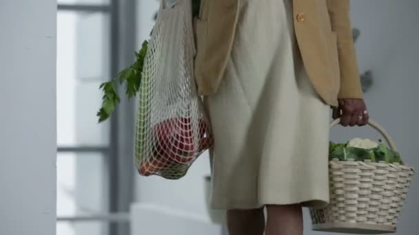 Woman lively walking up with groceryies — Stock Video