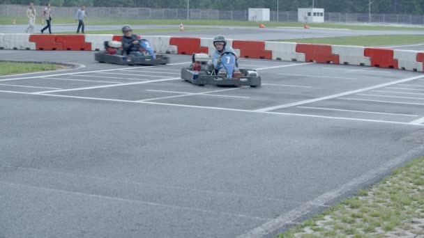 Cart competition on race track — Stock Video
