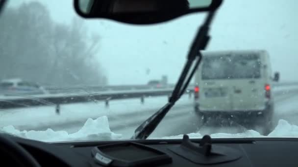 Driving car  in snow — Stock Video