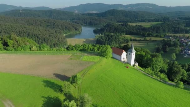 Isolated church with green landscape — Stock Video