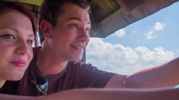 Couple on hunting tower  observing  nature — Stock Video