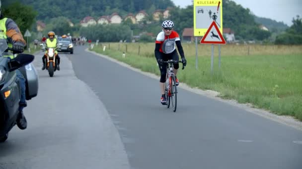 Cyclists riding on a bicycle marathon in Slovenia — Stock Video
