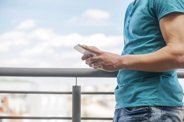 Young Man Using A Smartphone — Stock Photo, Image