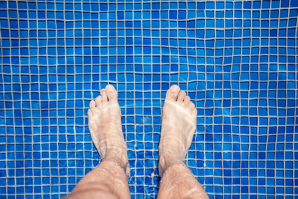 Man\'s Feet At Pool