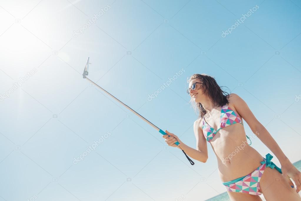 Female Taking Selfie At The Seashore