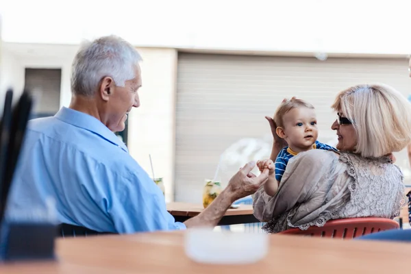 Grandparents With Their Grandson At Cafe — Stock Photo, Image