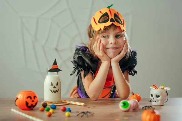 Portrait Little Girl Dressed Halloween Witch Costume Pumpkin Mask Sitting — Stock Photo, Image