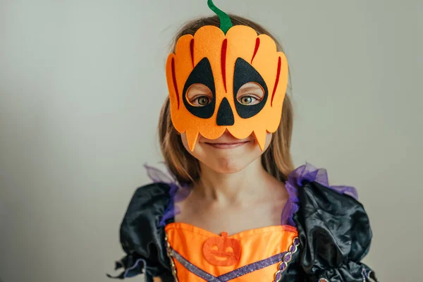 Portrait Little Girl Dressed Halloween Witch Costume Pumpkin Mask Indoor — Stock Photo, Image