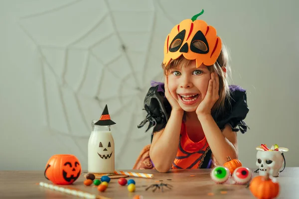 Portrait Little Girl Dressed Halloween Witch Costume Pumpkin Mask Sitting — Stock Photo, Image