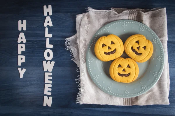 Halloween pumpkin cookies celebration with white text — Stock Photo, Image