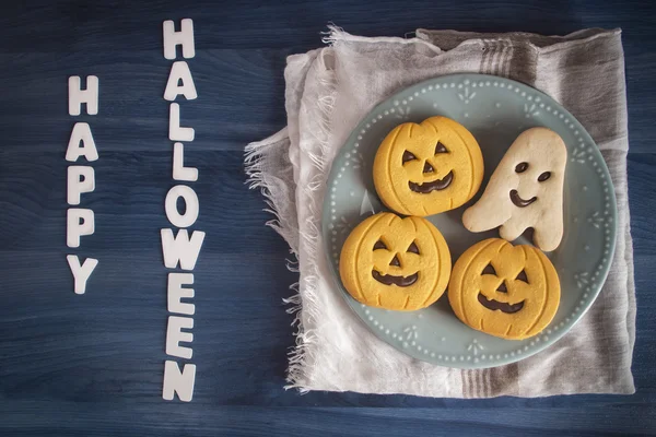 Oslava Halloween dýně soubory cookie s bílým textem — Stock fotografie