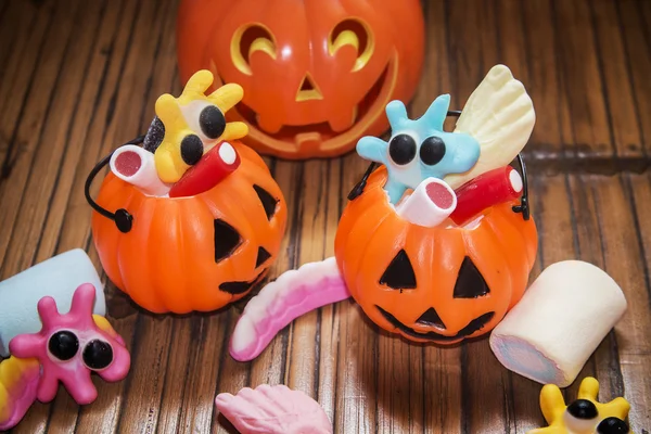 Candies with pumpkins in Halloween festivities — Stock Photo, Image