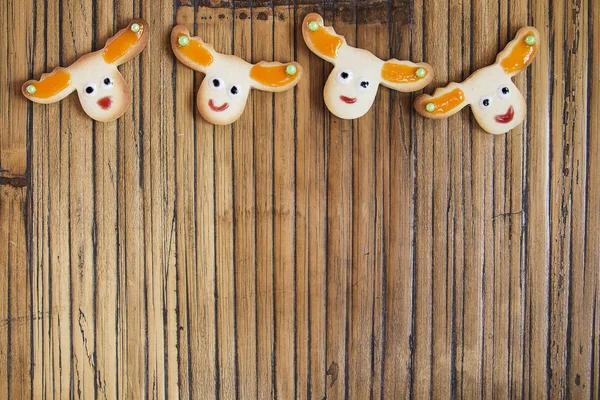 Christmas Cookies reindeer on wooden table — Stock Photo, Image