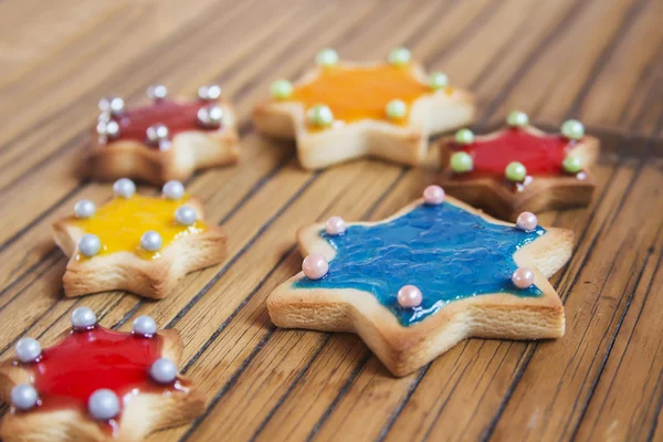 Christmas Cookies stars on wooden table — Stock Photo, Image