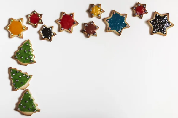 Christmas handgjorda cookies stjärnor på vit bakgrund — Stockfoto