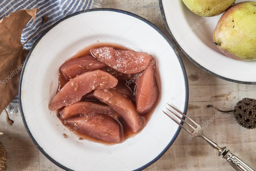 Poached pears with brandy sauce