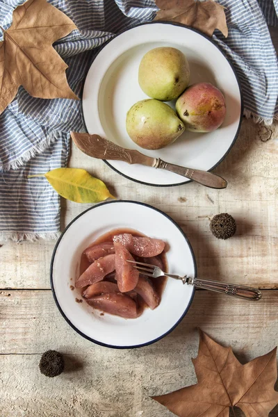 Poached pears with brandy sauce in autumn — Stock Photo, Image