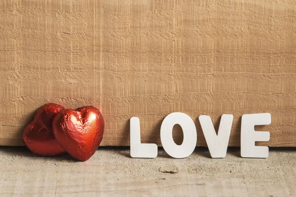 Amor letras vintage en madera rústica — Foto de Stock