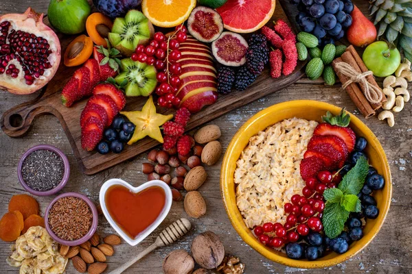 Granola Bowl Table Many Berries Fresh Fruits Nuts Healthy Breakfast — Stock Photo, Image