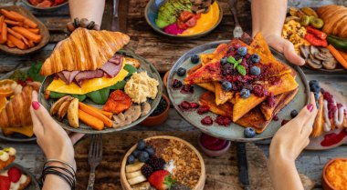 French toast with strawberries, blueberries and syrup & marmalade. 