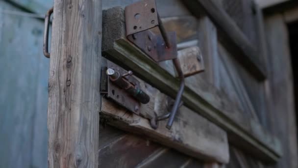 Wooden authentic rough gate with old door bolts. — Stock Footage Wooden authentic rough gate with old door bolts. Royalty Free Stock Footage