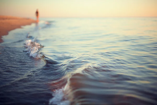 Strand zonsondergang abstracte achtergrond kustlijn close-up — Stockfoto