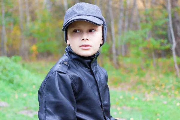 Chil boy pensive thoughtful look forest fall — Stock Photo, Image