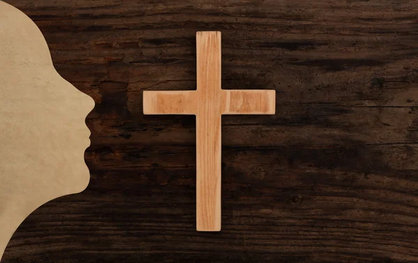 Christian woman pray concept cross wooden silhouette paper cut — Stock Photo, Image