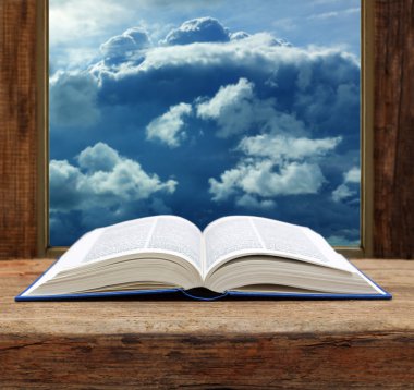 Bible open book  wooden window sky view stormy cloud clipart