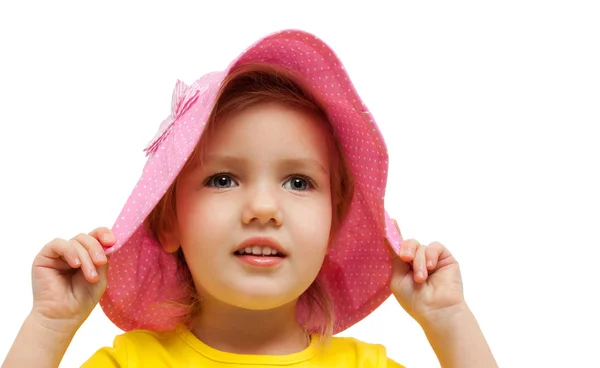 Kind Mädchen rosa Hut aussehen bewundern Mode-Porträt — Stockfoto