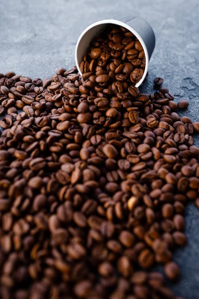 Coffee beans in a paper cup. — Stock Photo, Image