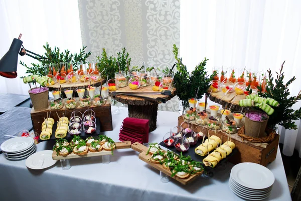 Catering service. Snacks for guests on the table. Royalty Free Stock Photos