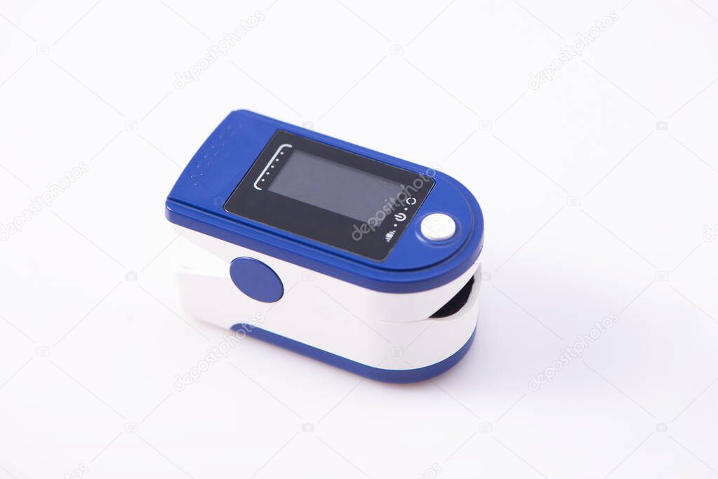 Close up. Pulse oximeter isolated on white background. Copy space. Top view.