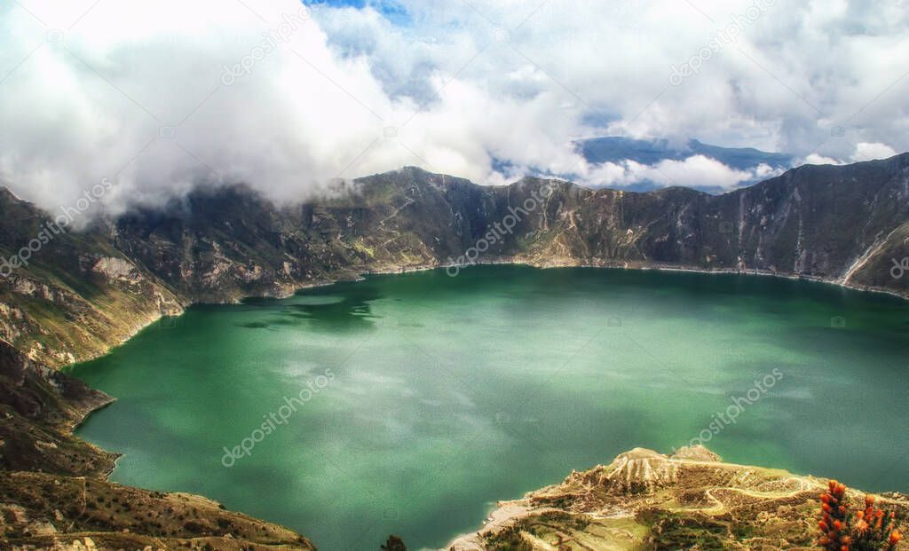 The turquoise volcano crater lagoon of Quilotoa along the famous hike called Quilotoa Loop near Quito, Ecuador.
