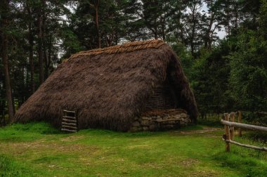 Newtonmore, Scotland - 23 July 2025:Thatched Roof Dwelling at the Highland Fold Museum, Scotland UK
