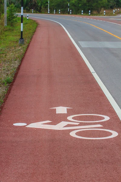 Bicycle road sign on asphalt — Stock Photo, Image