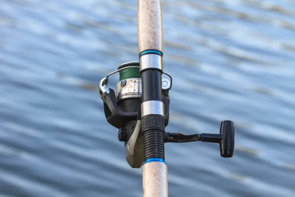 Fishing rods on riverside — Stock Photo, Image