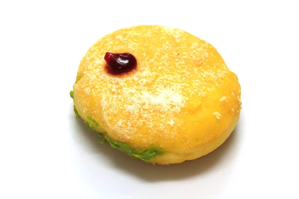 Барвистий пончик на білому тлі — стокове фото