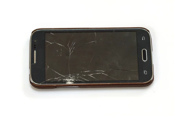 Smartphone with broken screen — Stock Photo, Image