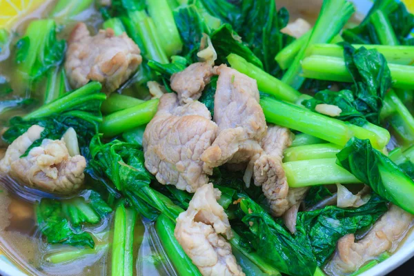 Fried chinese cabbage with pork in oyster sauce — Stock Photo, Image