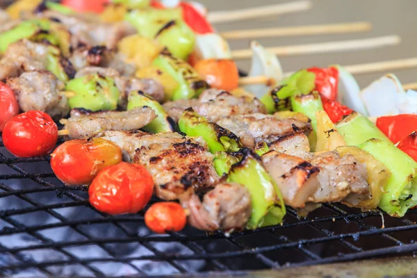 Grilling shashlik on barbecue grill — Stock Photo, Image