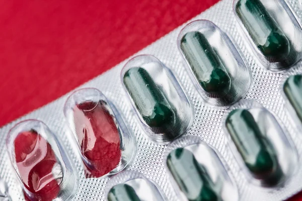 Tabletki i kapsułki antybiotyków w opakowań typu blister — Zdjęcie stockowe