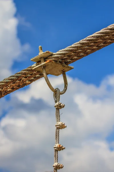 Sling bridge on sky background — Stock Photo, Image