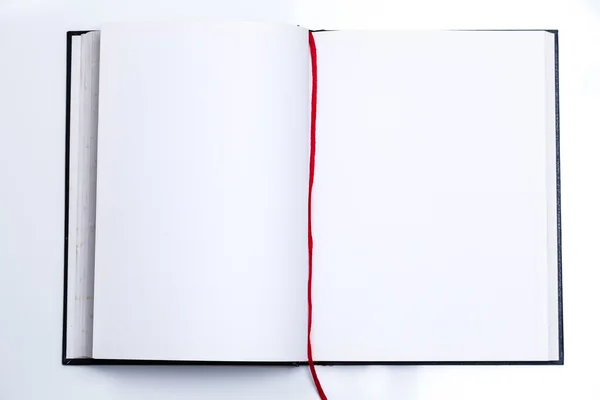 Libro abierto en blanco con cinta roja —  Fotos de Stock